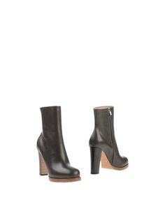 Полусапоги и высокие ботинки CÉline