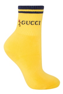 Желтые носки с синим логотипом Gucci