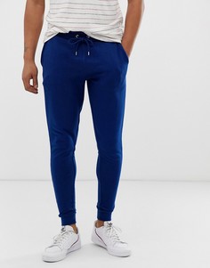 Темно-синие супероблегающие джоггеры ASOS DESIGN - Темно-синий