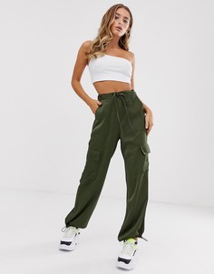 Брюки в стиле милитари с карманами ASOS DESIGN - Зеленый