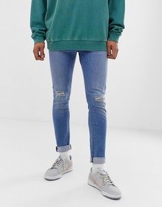 Светлые джинсы скинни с рваными коленями ASOS DESIGN - Синий