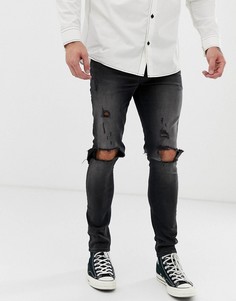 Черные джинсы скинни с рваной отделкой ASOS DESIGN recycled - Черный