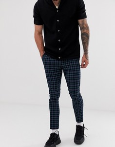 Темно-синие зауженные брюки в клетку ASOS DESIGN - Темно-синий