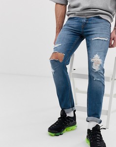 Выбеленные синие рваные джинсы скинни ASOS DESIGN - Синий