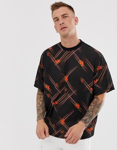 Oversize-футболка с цветочным принтом и диагональной клеткой ASOS DESIGN - Черный
