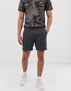 Черные выбеленные шорты чиносы узкого кроя с эластичным поясом ASOS DESIGN - Черный