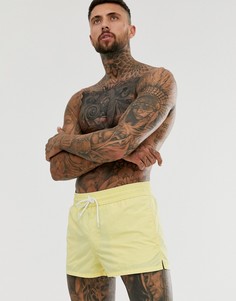Желтые короткие шорты для плавания с эффектом кислотной стирки ASOS DESIGN - Желтый