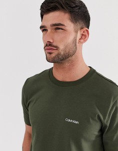 Темно-зеленая футболка с маленьким логотипом на груди Calvin Klein - Зеленый