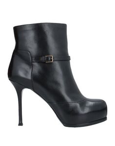 Полусапоги и высокие ботинки Saint Laurent