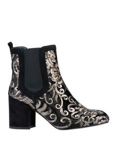 Полусапоги и высокие ботинки Stuart Weitzman