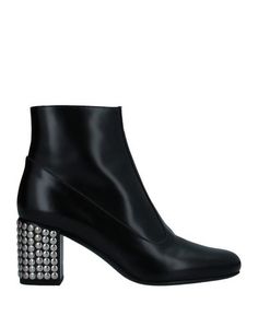 Полусапоги и высокие ботинки Saint Laurent