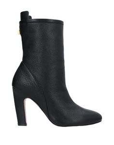 Полусапоги и высокие ботинки Stuart Weitzman