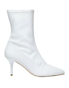 Полусапоги и высокие ботинки Stuart Weitzman