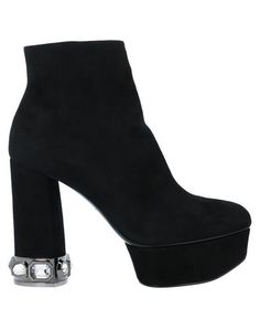 Полусапоги и высокие ботинки Casadei
