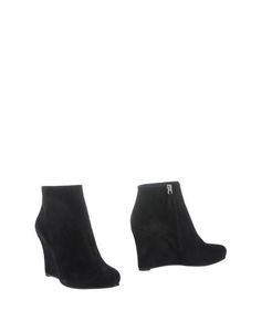 Полусапоги и высокие ботинки Jil Sander