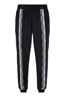 Черно-белые брюки с брендированной тесьмой Adidas