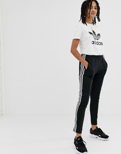 Черные брюки-сигареты с тремя полосками adidas Originals adicolor - Черный