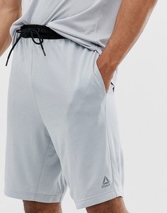 Серые меланжевые спортивные шорты Reebok - Серый