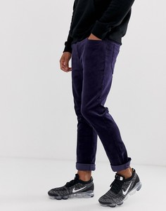 Узкие вельветовые брюки темно-синего цвета ASOS DESIGN - Темно-синий