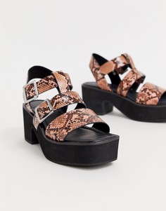 Розовые босоножки на среднем каблуке со змеиным рисунком ASOS DESIGN Helper - Розовый