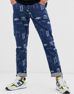 Суженные книзу темные джинсы в винтжном стиле с принтом ASOS DESIGN - Синий