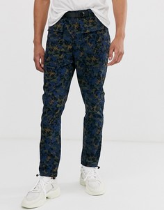 Свободные джоггеры в стиле милитари с абстрактным принтом ASOS DESIGN - Темно-синий