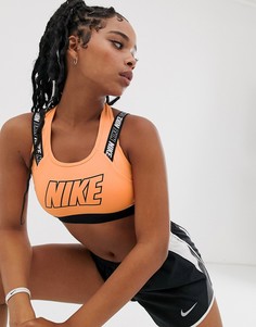 Оранжевый спортивный бюстгальтер Nike Training - Оранжевый