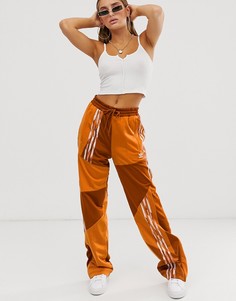Оранжевые спортивные брюки adidas Originals x Danielle Cathari - Оранжевый