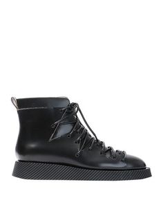 Полусапоги и высокие ботинки Jil Sander