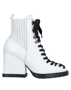 Полусапоги и высокие ботинки Santoni