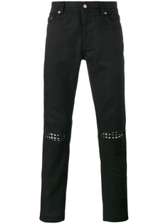 Saint Laurent джинсы с заклепками на коленях