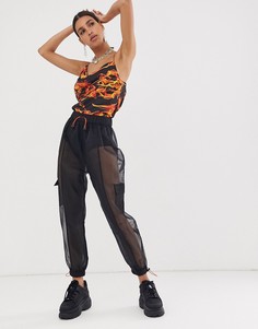 Полупрозрачные брюки в стиле милитари с карманами ASOS DESIGN - Черный