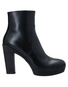 Полусапоги и высокие ботинки Santoni