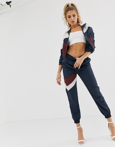 Темно-синие джоггеры в стиле колор блок ASOS DESIGN - Темно-синий