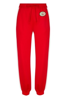 Красные спортивные брюки с логотипом Gucci