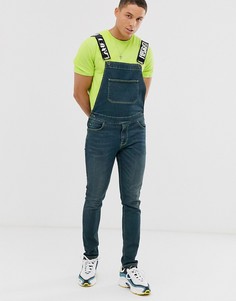 Джинсовый комбинезон скинни с неоновой строчкой и принтом на ремешках ASOS DESIGN - Синий