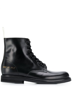 Common Projects branded ankle boots