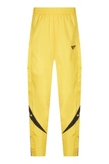 Желтые спортивные брюки Classics Vector Reebok