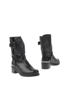 Полусапоги и высокие ботинки Stuart Weitzman