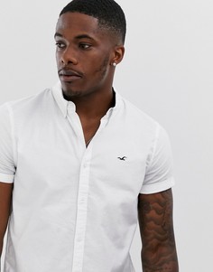Белая оксфордская рубашка на пуговицах с короткими рукавами и логотипом Hollister - Белый
