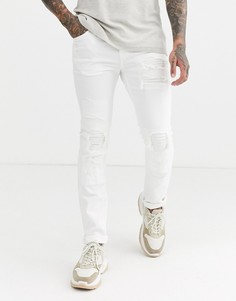 Белые рваные джинсы зауженного кроя True Religion rocco - Белый