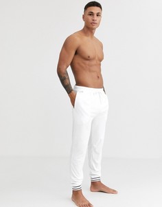 Белые джоггеры с логотипом и кромкой манжетом Lacoste Shower Terry 4 - Белый