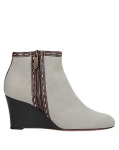 Полусапоги и высокие ботинки Santoni
