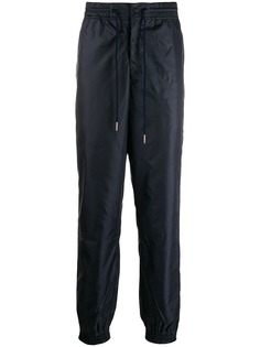 Thom Browne спортивные брюки из рипстопа с полосками RWB