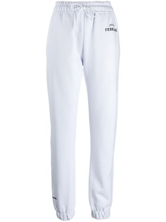 Chiara Ferragni winking eye track trousers