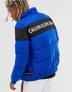 Синяя дутая куртка с полоской на груди Calvin Klein Jeans - Синий