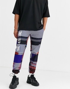 Суженные книзу брюки с принтом ASOS DESIGN - Синий