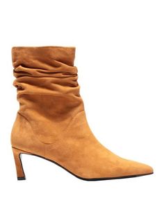 Полусапоги и высокие ботинки Stuart Weitzman