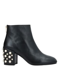 Полусапоги и высокие ботинки Stuart Weitzman