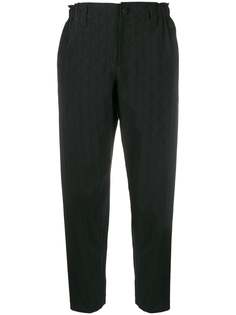 Issey Miyake geometric print tapered trousers